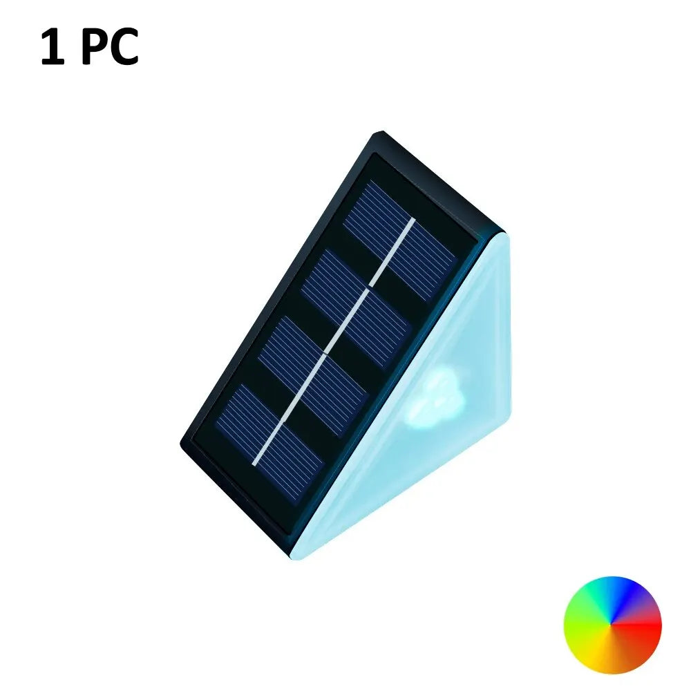 Lámpara LED solar de pared triangular para exteriores, luz ambiental multicolor.