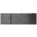 Teclado plegable inalámbrico con touchpad, accesorio tecnológico compacto para hogar moderno.