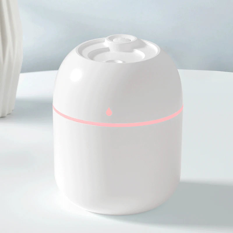 Humidificador LED blanco moderno para hogar sobre mesa, diseño minimalista y elegante