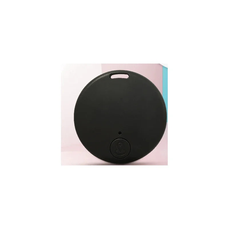 Localizador inteligente negro circular para llaves, gadget tecnológico para hogar moderno