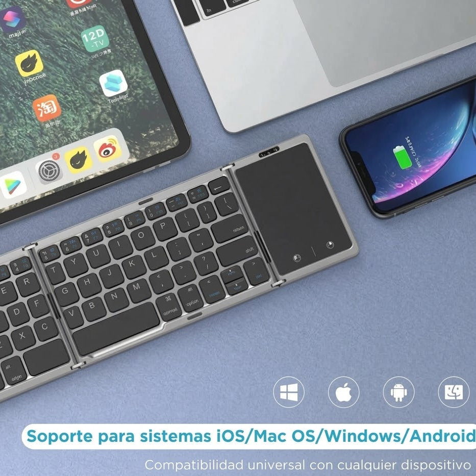 Teclado plegable inalámbrico con touchpad junto a tablet, laptop y smartphone, compatible con iOS, Mac, Windows y Android